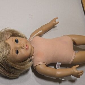 American Girl Doll with Blonde Hair and Blue Eyes